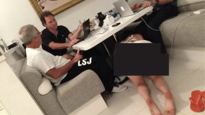 Epstein dosyasında yeni skandal! Dünyayı ayağa kaldıran kare: Masanın altındaki kadına ve duvardaki resme dikkat!