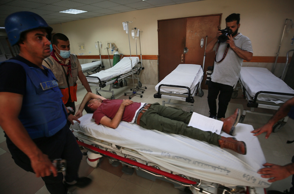 İsrail'in saldırılarında Anadolu Ajansı kameramanı yaralandı - Sayfa 15