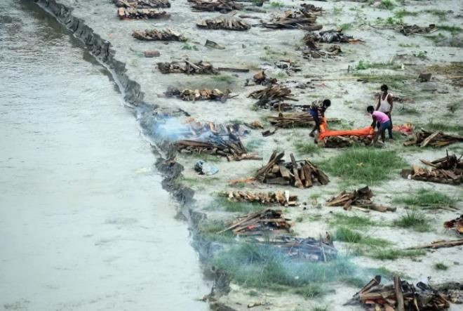 Hindistan'da kan donduran olay: Koronadan ölenlerin cesedi kıyıya vurdu! - Sayfa 5