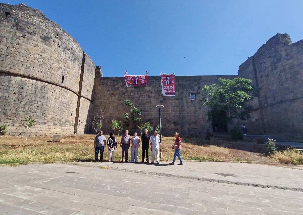 Diyarbakır surlarına asılan 'İmamoğlu' pankartlarına polis el koydu, CHP'li başkana ceza kesildi - Sayfa 1