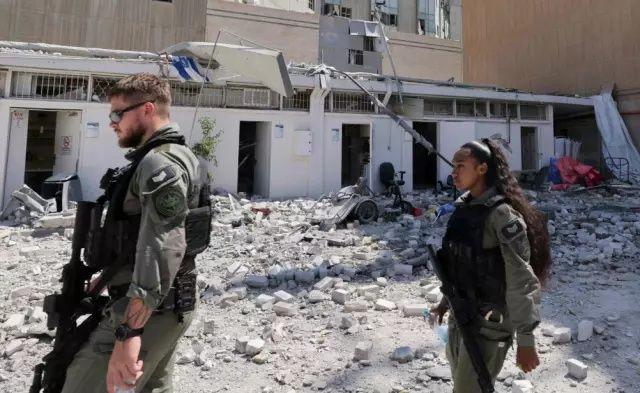 İsrail-İran savaşında 8. gün: Füze yağmuru durmuyor, İsrail'in siber güvenlik merkezi imha edildi! - Sayfa 1